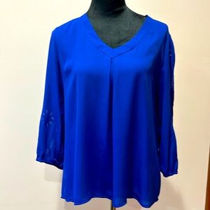 Flattering blue top with arm detail